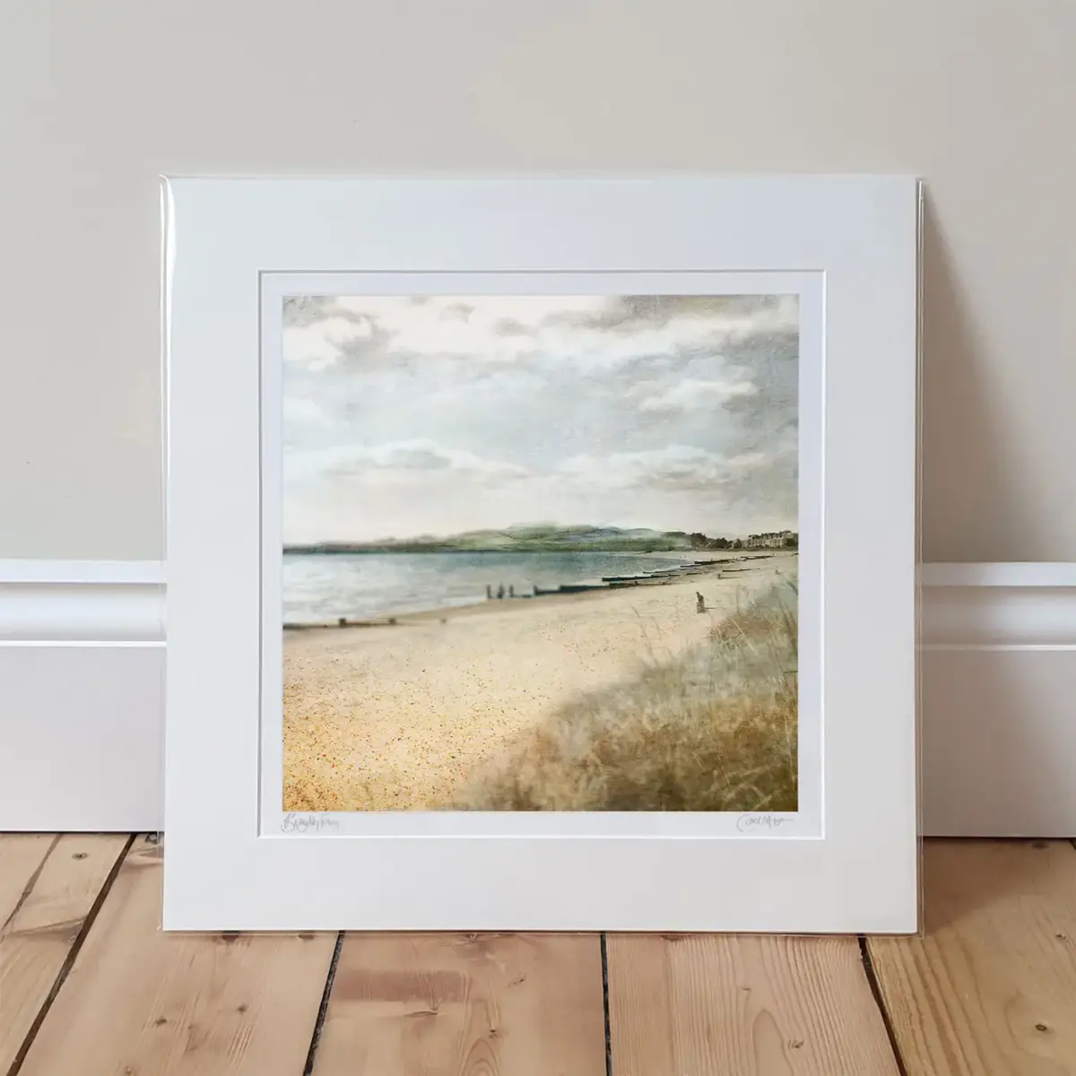 Broughty Ferry Beach, Dundee mounted print standing against a pale wall and on a wooden floor